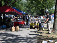 View of the crime scene with evidence markers placed on the ground. The NYPD says in an update that one person is killed and four other peop...