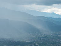 Rainfall over Kathmandu Valley as seen from Nagarkot in Kathmandu, Nepal, on October 5, 2023. (