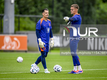 Netherlands goalkeeper Nick Olij and Netherlands goalkeeper Bart Verbruggen during the training and press conference for the Netherlands Nat...