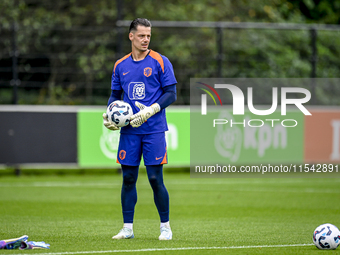 Netherlands goalkeeper Nick Olij participates in the training and press conference for the Netherlands Nations League season 2024-2025 at th...