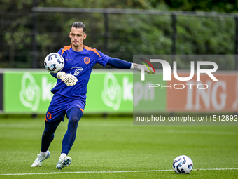 Netherlands goalkeeper Nick Olij participates in the training and press conference for the Netherlands Nations League season 2024-2025 at th...