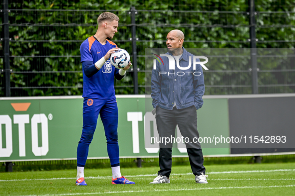 Netherlands goalkeeper Bart Verbruggen and KNVB technical director Nigel de Jong during the training and press conference for the Netherland...