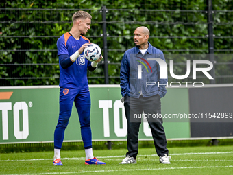 Netherlands goalkeeper Bart Verbruggen and KNVB technical director Nigel de Jong during the training and press conference for the Netherland...