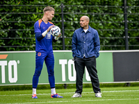 Netherlands goalkeeper Bart Verbruggen and KNVB technical director Nigel de Jong during the training and press conference for the Netherland...