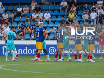 Players are in action during the Primera RFEF 2024-2025 match between FC Andorra and FC Barcelona Atletic at Estadi Nacional d'Andorra in An...