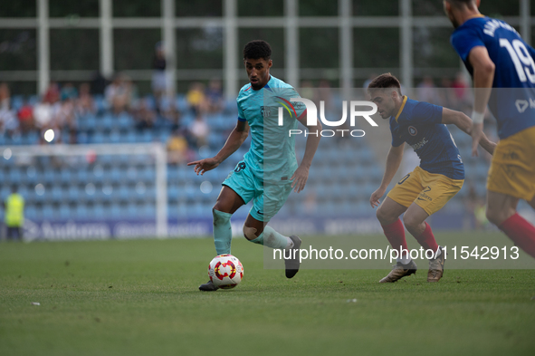 Oiscar Urena of FC Futbol Club Barcelona Atletic is in action during the Primera RFEF 2024-2025 match between FC Andorra and FC Barcelona At...