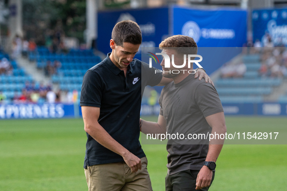 In Andorra La Vella, Andorra, on August 31, 2024, Ferran Costa, coach of FC Andorra, and Albert Sanchez, coach of FC Barcelona Atletic, are...