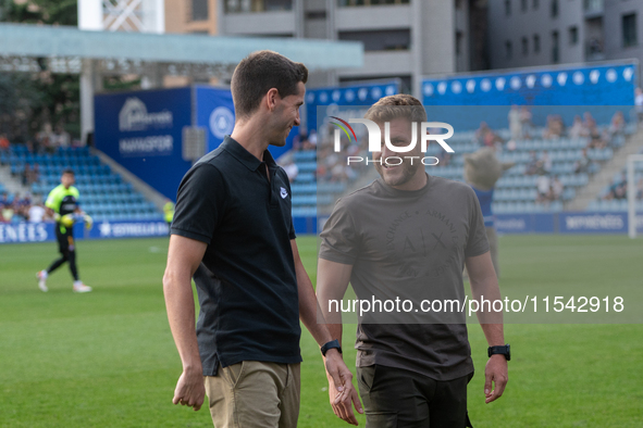 In Andorra La Vella, Andorra, on August 31, 2024, Ferran Costa, coach of FC Andorra, and Albert Sanchez, coach of FC Barcelona Atletic, are...