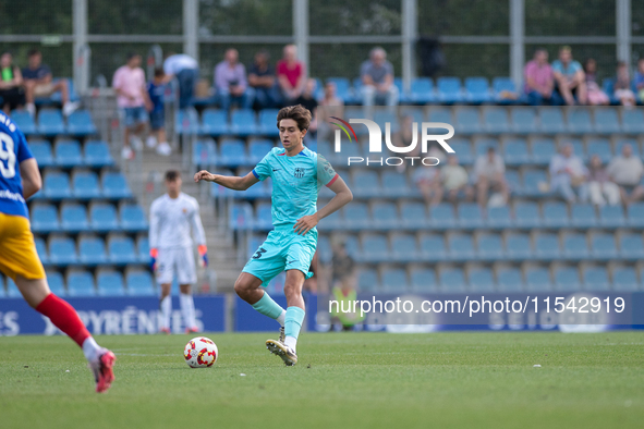 Gerard Martin of FC Futbol Club Barcelona Atletic is in action during the Primera RFEF 2024-2025 match between FC Andorra and FC Barcelona A...