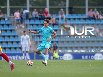 Gerard Martin of FC Futbol Club Barcelona Atletic is in action during the Primera RFEF 2024-2025 match between FC Andorra and FC Barcelona A...