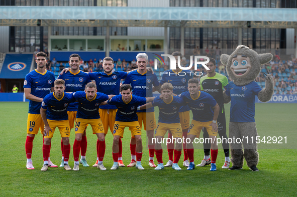 In Andorra La Vella, Andorra, on August 31, 2024, FC Andorra players form during the Primera RFEF 2024-2025 match between FC Andorra and FC...