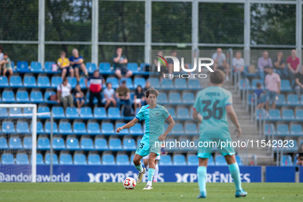 Alexis Olmedo of FC Futbol Club Barcelona Atletic is in action during the Primera RFEF 2024-2025 match between FC Andorra and FC Barcelona A...