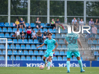 Alexis Olmedo of FC Futbol Club Barcelona Atletic is in action during the Primera RFEF 2024-2025 match between FC Andorra and FC Barcelona A...