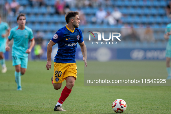 Marti Vila of FC Andorra plays during the Primera RFEF 2024-2025 match between FC Andorra and FC Barcelona Atletic at Estadi Nacional d'Ando...