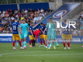 Players are in action during the Primera RFEF 2024-2025 match between FC Andorra and FC Barcelona Atletic at Estadi Nacional d'Andorra in An...