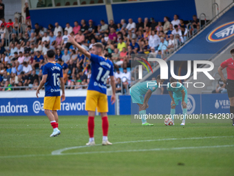 Players are in action during the Primera RFEF 2024-2025 match between FC Andorra and FC Barcelona Atletic at Estadi Nacional d'Andorra in An...