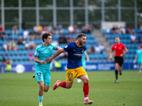 Diego Alende of FC Andorra and Juan Piera of FC Barcelona Atletic are in action during the Primera RFEF 2024-2025 match between FC Andorra a...