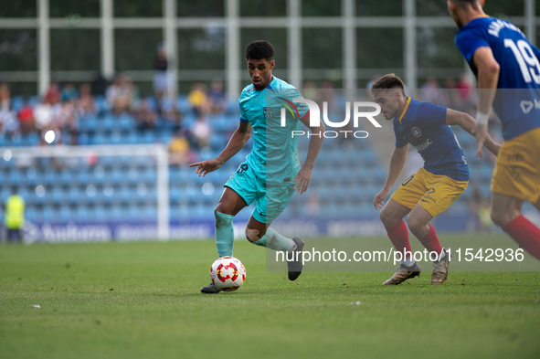 Oiscar Urena of FC Futbol Club Barcelona Atletic is in action during the Primera RFEF 2024-2025 match between FC Andorra and FC Barcelona At...