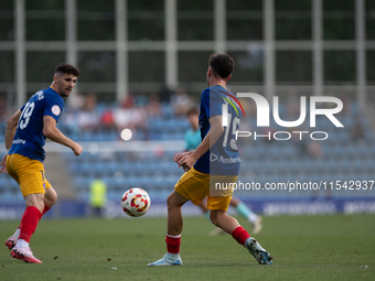 Players are in action during the Primera RFEF 2024-2025 match between FC Andorra and FC Barcelona Atletic at Estadi Nacional d'Andorra in An...