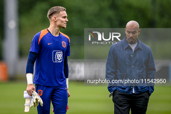 Netherlands goalkeeper Bart Verbruggen and KNVB technical director Nigel de Jong during the training and press conference for the Netherland...