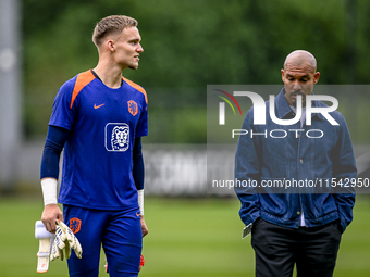 Netherlands goalkeeper Bart Verbruggen and KNVB technical director Nigel de Jong during the training and press conference for the Netherland...