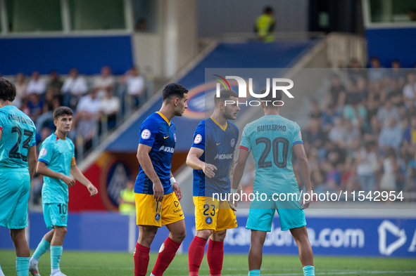 Players are in action during the Primera RFEF 2024-2025 match between FC Andorra and FC Barcelona Atletic at Estadi Nacional d'Andorra in An...