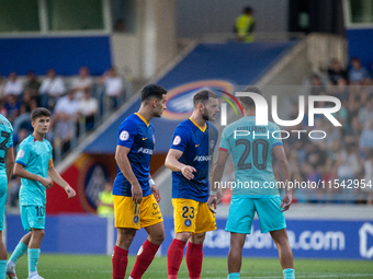 Players are in action during the Primera RFEF 2024-2025 match between FC Andorra and FC Barcelona Atletic at Estadi Nacional d'Andorra in An...