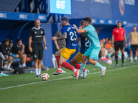 Players are in action during the Primera RFEF 2024-2025 match between FC Andorra and FC Barcelona Atletic at Estadi Nacional d'Andorra in An...