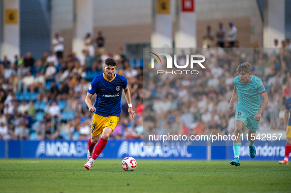 Almpanis is in action during the Primera RFEF 2024-2025 match between FC Andorra and FC Barcelona Atletic at Estadi Nacional d'Andorra in An...