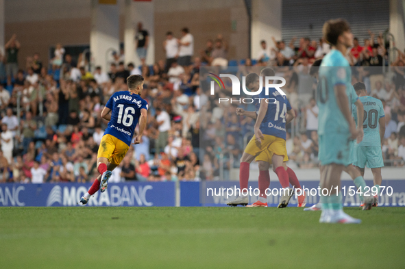 FC Andorra players celebrate after scoring a goal during the Primera RFEF 2024-2025 match between FC Andorra and FC Barcelona Atletic at Est...