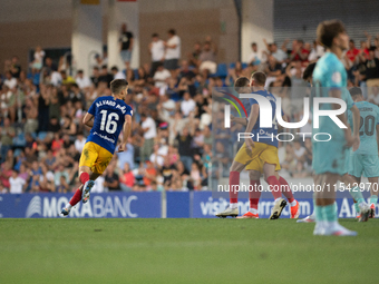 FC Andorra players celebrate after scoring a goal during the Primera RFEF 2024-2025 match between FC Andorra and FC Barcelona Atletic at Est...