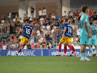 FC Andorra players celebrate after scoring a goal during the Primera RFEF 2024-2025 match between FC Andorra and FC Barcelona Atletic at Est...