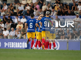 FC Andorra players celebrate after scoring a goal during the Primera RFEF 2024-2025 match between FC Andorra and FC Barcelona Atletic at Est...