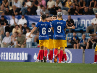 FC Andorra players celebrate after scoring a goal during the Primera RFEF 2024-2025 match between FC Andorra and FC Barcelona Atletic at Est...