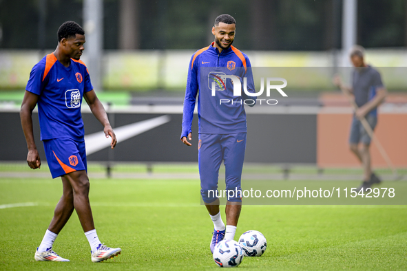 Netherlands player Denzel Dumfries and Netherlands player Cody Gakpo during the training and press conference for the Netherlands Nations Le...