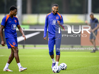 Netherlands player Denzel Dumfries and Netherlands player Cody Gakpo during the training and press conference for the Netherlands Nations Le...