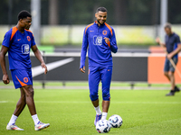 Netherlands player Denzel Dumfries and Netherlands player Cody Gakpo during the training and press conference for the Netherlands Nations Le...