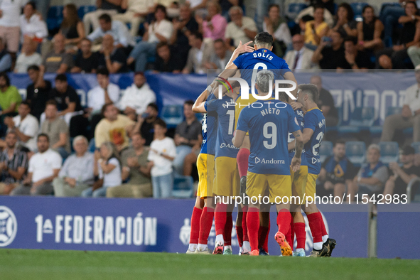 FC Andorra players celebrate after scoring a goal during the Primera RFEF 2024-2025 match between FC Andorra and FC Barcelona Atletic at Est...