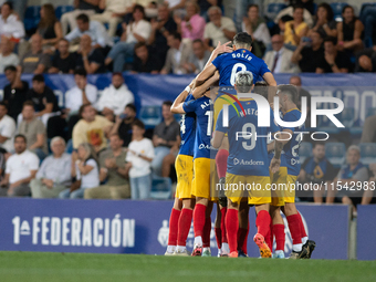 FC Andorra players celebrate after scoring a goal during the Primera RFEF 2024-2025 match between FC Andorra and FC Barcelona Atletic at Est...