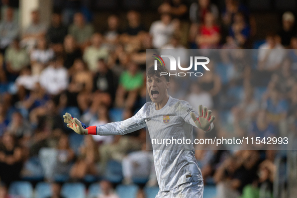 Diego Kochen of FC Futbol Club Barcelona Atletic is in action during the Primera RFEF 2024-2025 match between FC Andorra and FC Barcelona At...