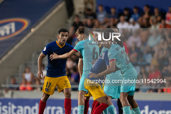 Players are in action during the Primera RFEF 2024-2025 match between FC Andorra and FC Barcelona Atletic at Estadi Nacional d'Andorra in An...