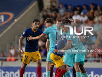 Players are in action during the Primera RFEF 2024-2025 match between FC Andorra and FC Barcelona Atletic at Estadi Nacional d'Andorra in An...