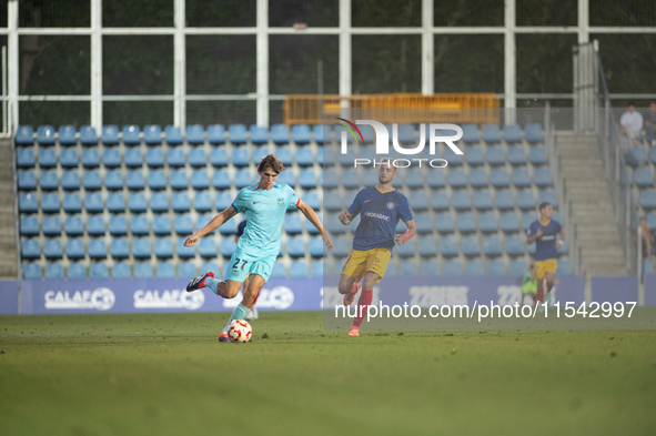 Players are in action during the Primera RFEF 2024-2025 match between FC Andorra and FC Barcelona Atletic at Estadi Nacional d'Andorra in An...