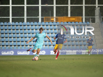 Players are in action during the Primera RFEF 2024-2025 match between FC Andorra and FC Barcelona Atletic at Estadi Nacional d'Andorra in An...