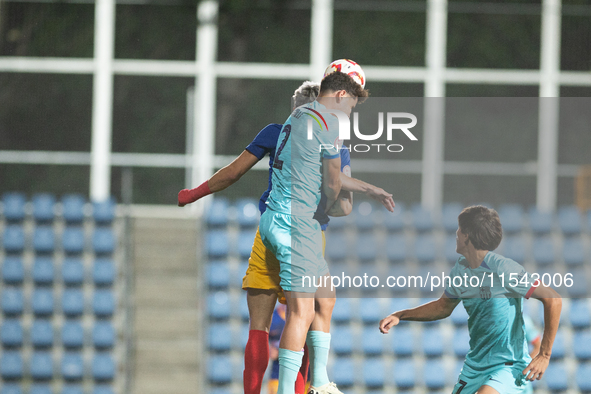 Players are in action during the Primera RFEF 2024-2025 match between FC Andorra and FC Barcelona Atletic at Estadi Nacional d'Andorra in An...