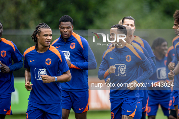 Netherlands player Nathan Ake and Netherlands player Justin Kluivert during the training and press conference for the Netherlands Nations Le...