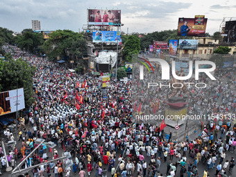 Various left front union members protest in Kolkata, India, on September 3, 2024, against the rape and murder of a second-year doctor at RG...