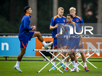 Netherlands players Tijjani Reijnders, Justin Kluivert, Matthijs de Ligt, and Jan Paul van Hecke during the training and press conference fo...