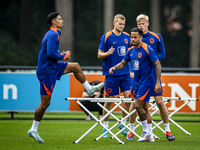 Netherlands players Tijjani Reijnders, Justin Kluivert, Matthijs de Ligt, and Jan Paul van Hecke during the training and press conference fo...