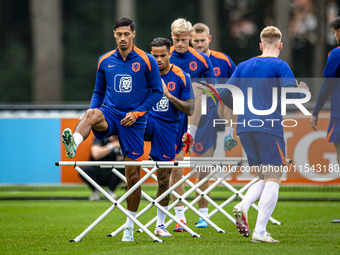 Netherlands player Tijjani Reijnders and Netherlands player Justin Kluivert during the training and press conference for the Netherlands Nat...